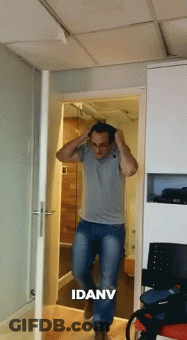 Two Men At Table One With Coca Cola Blue Box GIF