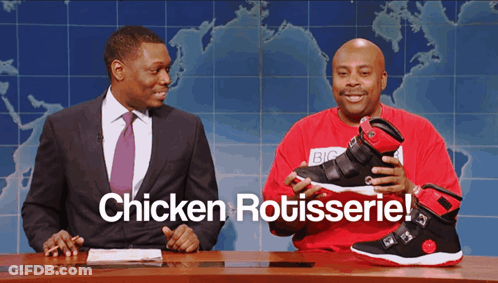 Two Men At Table Saying Chicken Rotisserie GIF