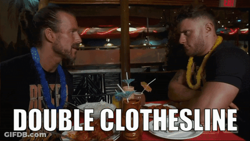 Two Men At Table With Food And Double Clothesline GIF