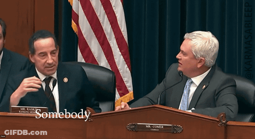 Two Men At Table With Name Plate Somebody GIF