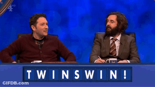Two Men At Table With Twinswin GIF