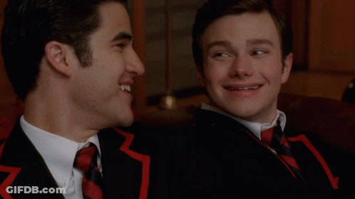 Two Men Beside Rally Poster GIF