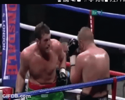 Two Men Boxing In A Ring With A Banner That Says ' Lonsdale ' On It GIF