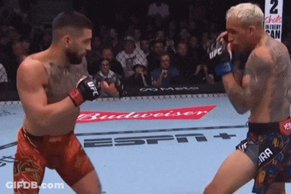 Two Men Boxing In Front Of Budweiser Banner GIF