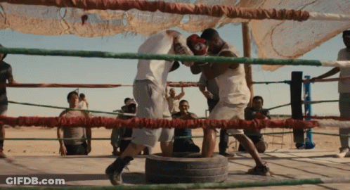 Two Men Boxing In Ring GIF