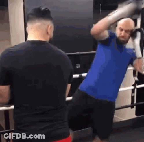 Two Men Boxing In Ring GIF