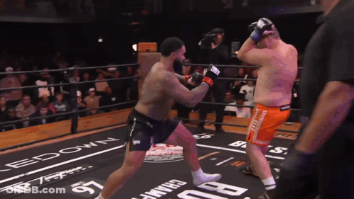 Two Men Boxing In Ring With Edown Sign GIF