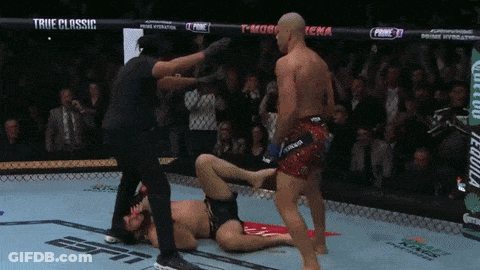 Two Men Boxing In Ring With True Classic GIF