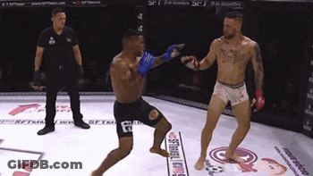 Two Men Boxing One With Jesus Chest Tattoo GIF