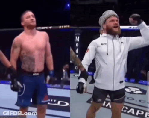 Two Men Boxing Ring One White UFC Jacket GIF