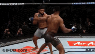 Two Men Boxing With Cadillac Ad GIF