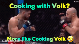 Two Men Boxing With Caption Cooking With Volks GIF