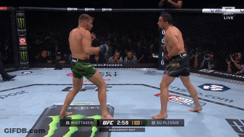 Two Men Boxing With Monster Energy Drink GIF
