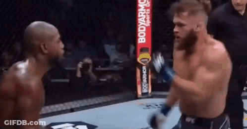 Two Men Boxing With Referee In Ring GIF