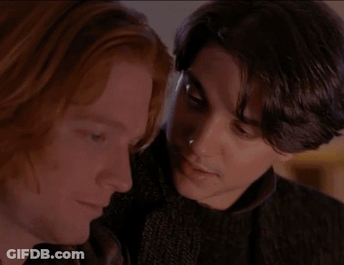 Two Men Close Up One With Red Hair GIF