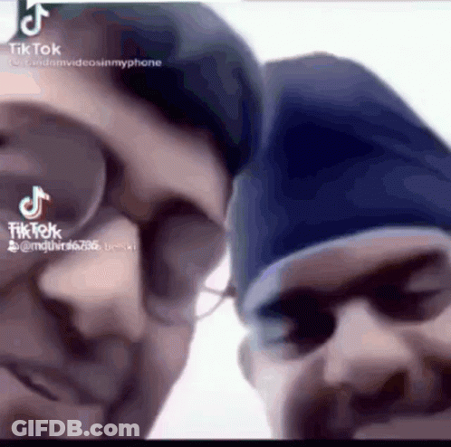 Two Men Close Up With TikTok Written Below GIF