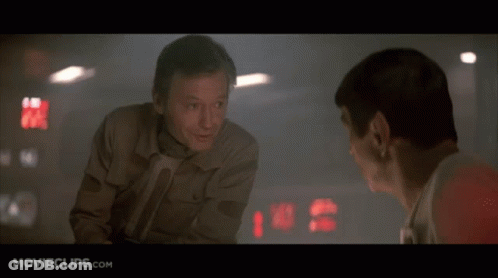 Two Men Conversing GIF