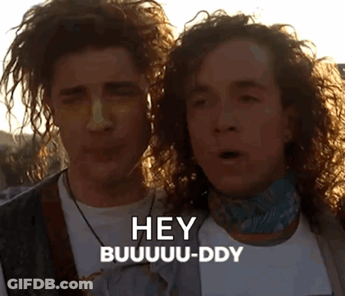 Two Men Curly Hair Saying Hey Buuuddy GIF