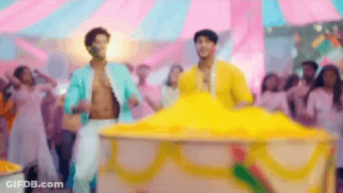 Two Men Dancing At Carnival GIF