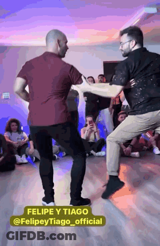Two Men Dancing In Front Of Crowd Felipe Y Tiago GIF