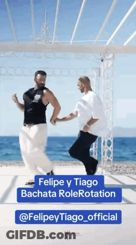 Two Men Dancing In Front Of Gazebo Felipe Y Tiago Bachata Rolerotation GIF