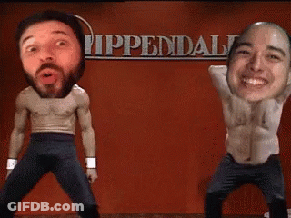 Two Men Dancing In Front Of Rippendal Sign GIF