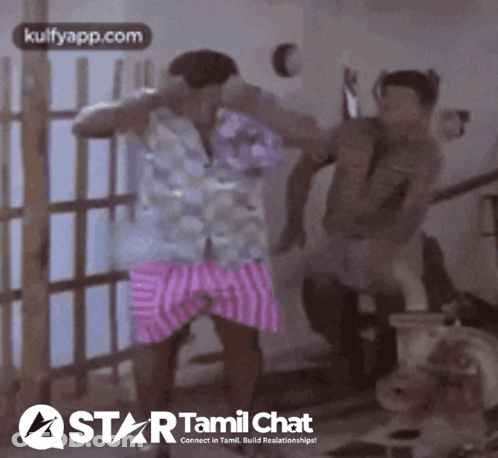 Two Men Dancing In Front Of Star Tamil Chat Logo GIF