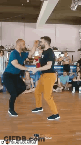 Two Men Dancing On Dance Floor GIF
