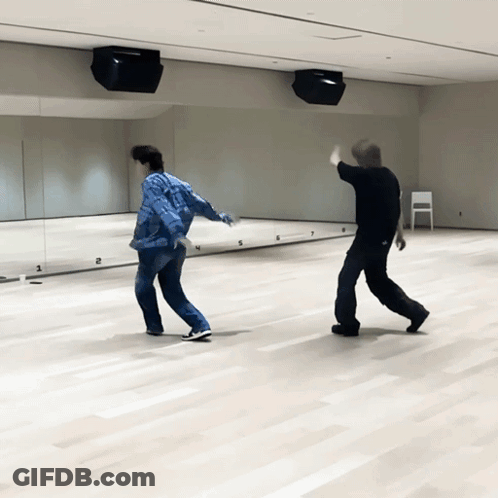 Two Men Dancing On Floor Numbers 1-5 GIF