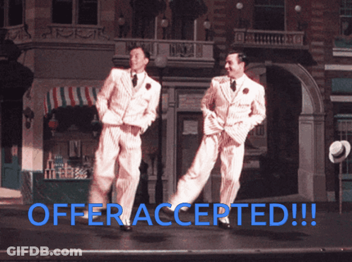 Two Men Dancing On Stage Offer Accepted GIF