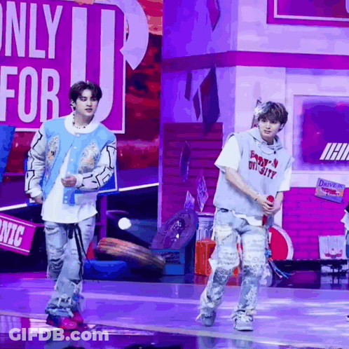 Two Men Dancing On Stage Saying Only For U GIF