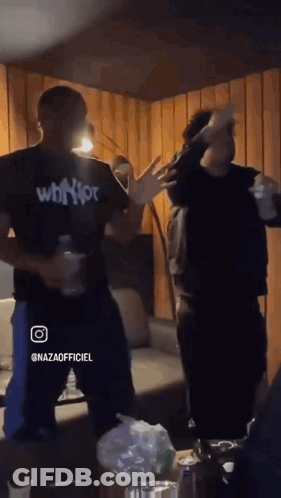 Two Men Dancing One Wearing Whoot Shirt GIF