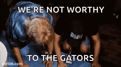 Two Men Doing Push Ups We're Not Worthy To The Gators GIF