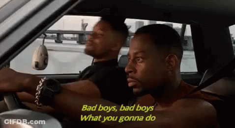 Two Men Driving Bad Boys Bad Boys What You Gonna Do GIF