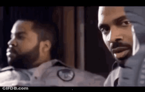 Two Men Facing Each Other One With Beard GIF