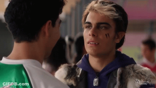 Two Men Facing Each Other One With Face Tattoo GIF