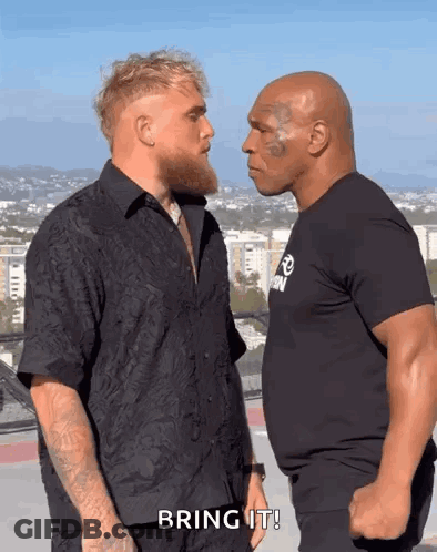 Two Men Facing Off Saying Bring It GIF