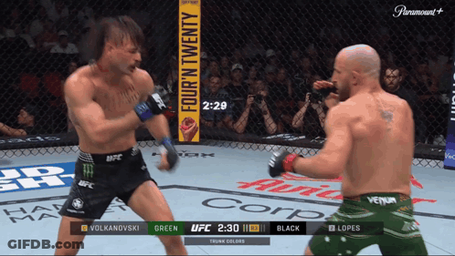 Two Men Fighting Boxing Ring Four N Twenty GIF