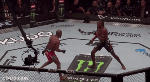 Two Men Fighting In Boxing Ring GIF