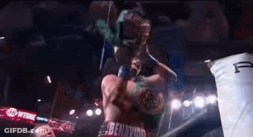 Two Men Fighting In Boxing Ring GIF
