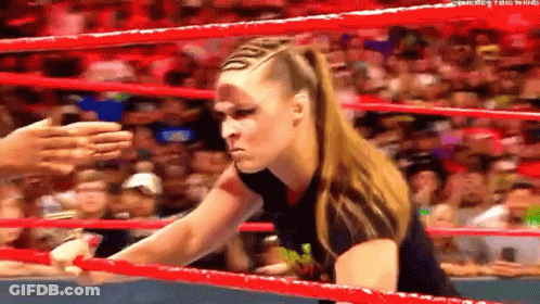 Two Men Fighting In Boxing Ring GIF