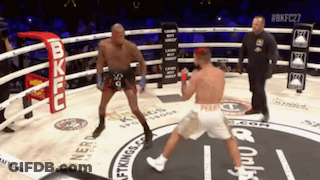 Two Men Fighting In Boxing Ring GIF