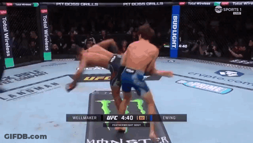 Two Men Fighting In Boxing Ring GIF