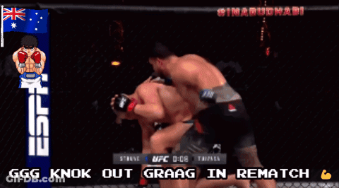 Two Men Fighting In Boxing Ring GIF