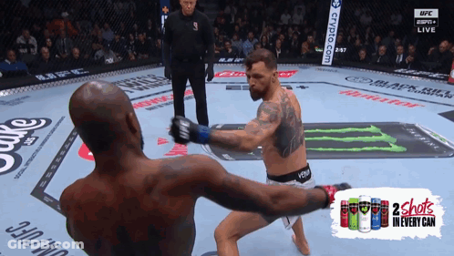 Two Men Fighting In Boxing Ring GIF