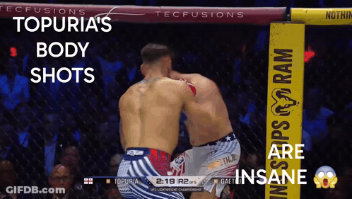 Two Men Fighting In Boxing Ring Body Shots GIF