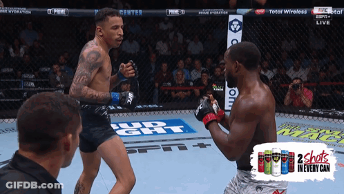 Two Men Fighting In Boxing Ring GIF