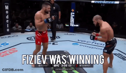 Two Men Fighting In Boxing Ring Fiziev Was Winning GIF