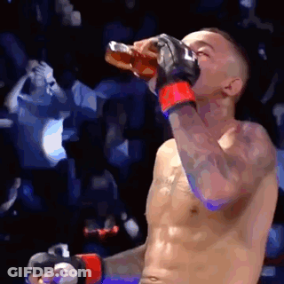 Two Men Fighting In Boxing Ring GIF