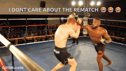 Two Men Fighting In Boxing Ring I Don't Care About Rematch GIF